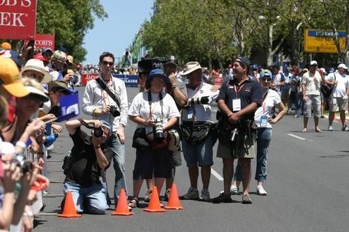 Some of the media await the finish