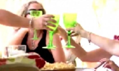 A group of Florida moms gather to toast to another Friday with a glass of wine while their kids play nearby.