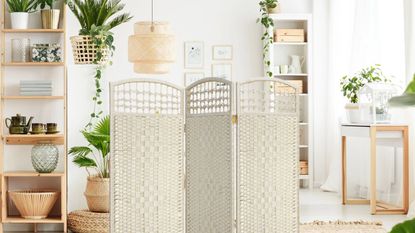 A white woven room divider in a room