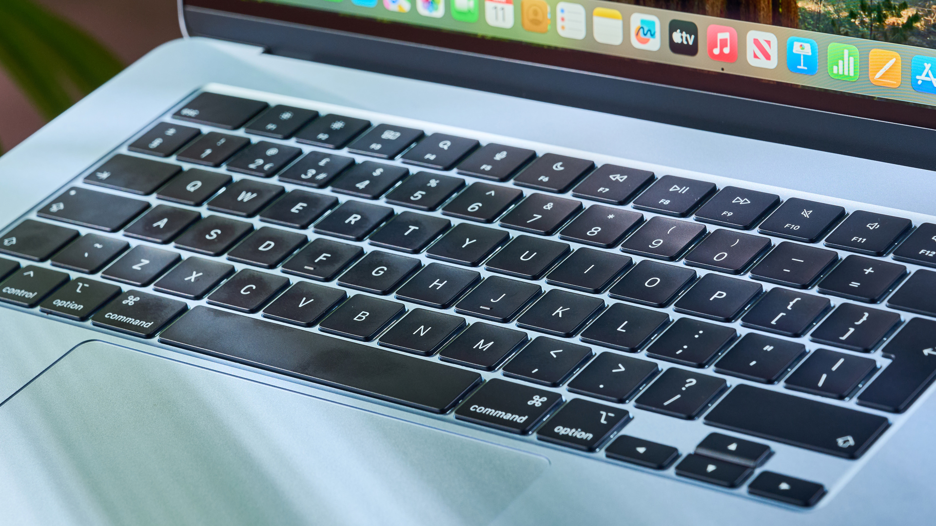 MacBook Air 15-inch with M4 chip on a creative's desk with screen open