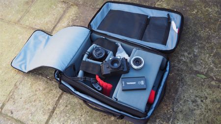 Manfrotto Manhattan Runner 50 camera bag open and filled with camera equipment