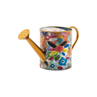 A colorful metal watering can
