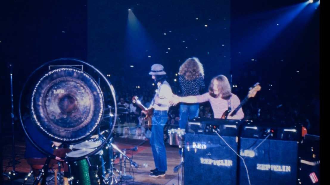 Led Zeppelin onstage, shot from behind John Bonham&#039;s kit