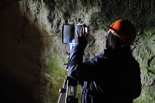 Researchers scanned the cave in three dimensions with laser surveying equipment and used structured light scanning to create detailed images of the carved stone symbols.