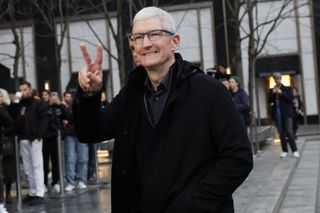 Apple CEO Tim Cook arrives as people stand in line to purchase the Apple Vision Pro headset at the Fifth Avenue Apple store on February 02, 2024 in New York City