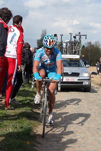 Aur&eacute;lien Clerc (Bouyges Telecom) grits his teeth as he rides as smooth a line as possible at the edge of the road.