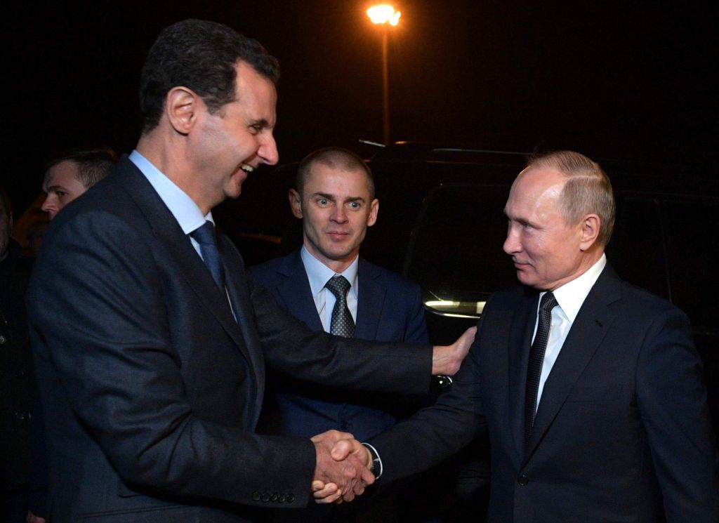 Bashar al-Assad and Vladimir Putin.