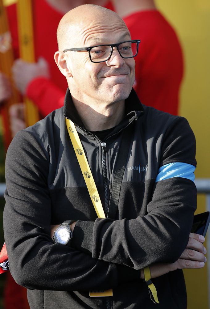 Dave Brailsford, manager of Team Sky, looks on during the trophy ceremony following 21 of the 2015 Tour de France