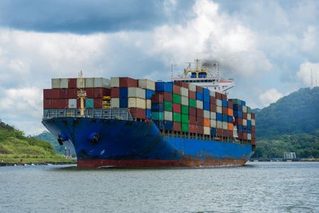 image of a freighter loaded with cargo on the Panama canal