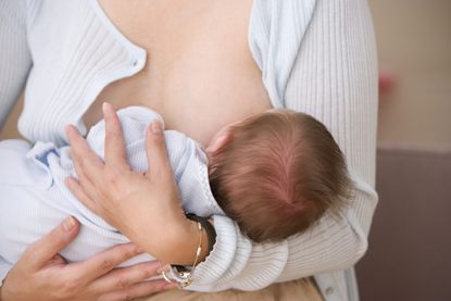 Mother breastfeeding her baby