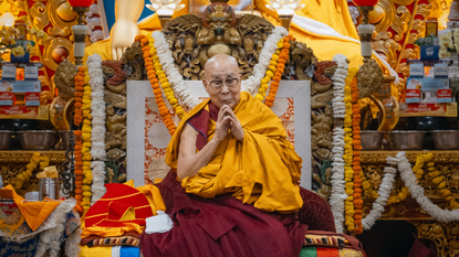 The Dalai Lama performs prayers during the celebration of his 90th birthday. 