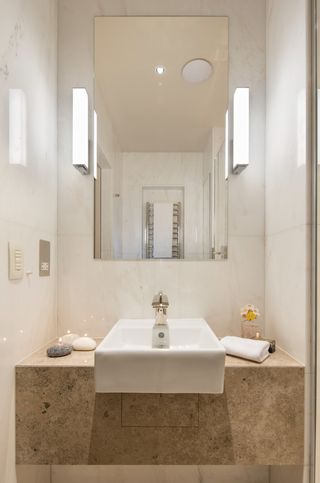 modern powder room with wall hung vanity