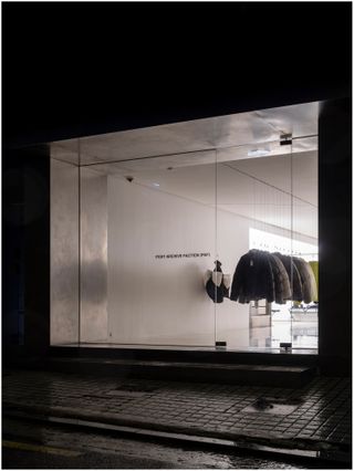 clothing store exterior at night