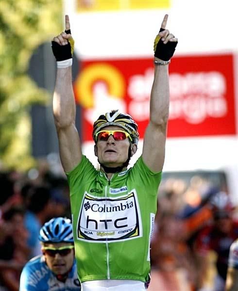 Stage winner Andr&eacute; Greipel (Columbia-HTC) raises his arms in triumph.