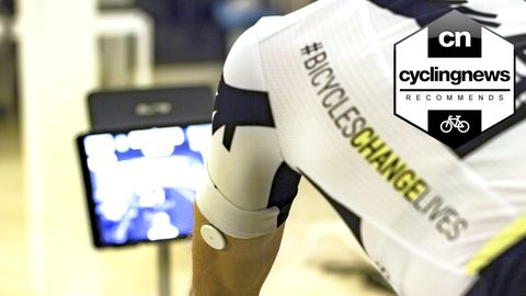 Rider from Qhubeka Assos using Supersapiens continous glucose monitor whilst riding on a turbo trainer