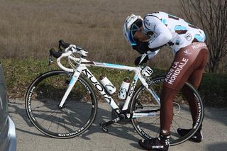 Ludovic Turpin (AG2R) makes an adjustment to his seatpost height