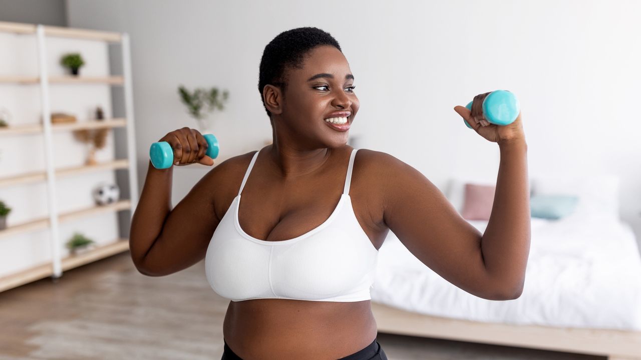 Woman performing a dumbbells workout