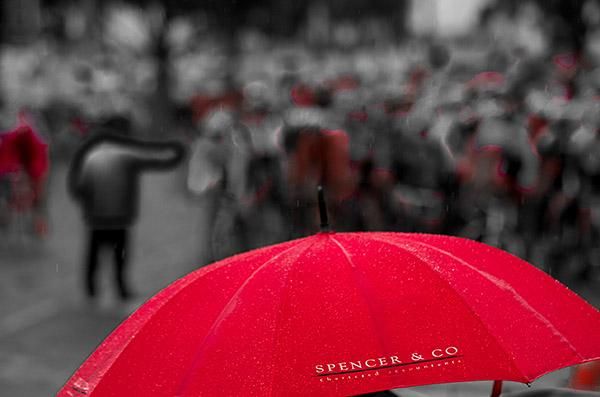 The peloton was forced to wait a lap after a crash in the wet conditions when a small group had edged away from the front of the field.