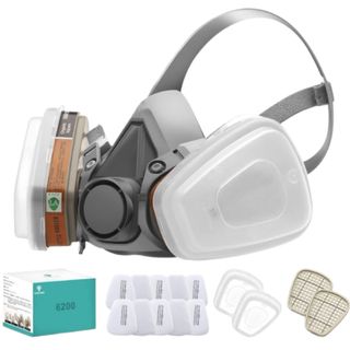Gray respirator mask with a box of white filters on a white background