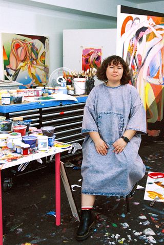 Portrait of artist Christina Quarles in her Los Angeles studio, surrounded by works for her upcoming show at Hauser & Wirth Menorca