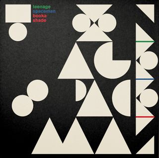 Black background and white geometrical shapes on record sleeve cover