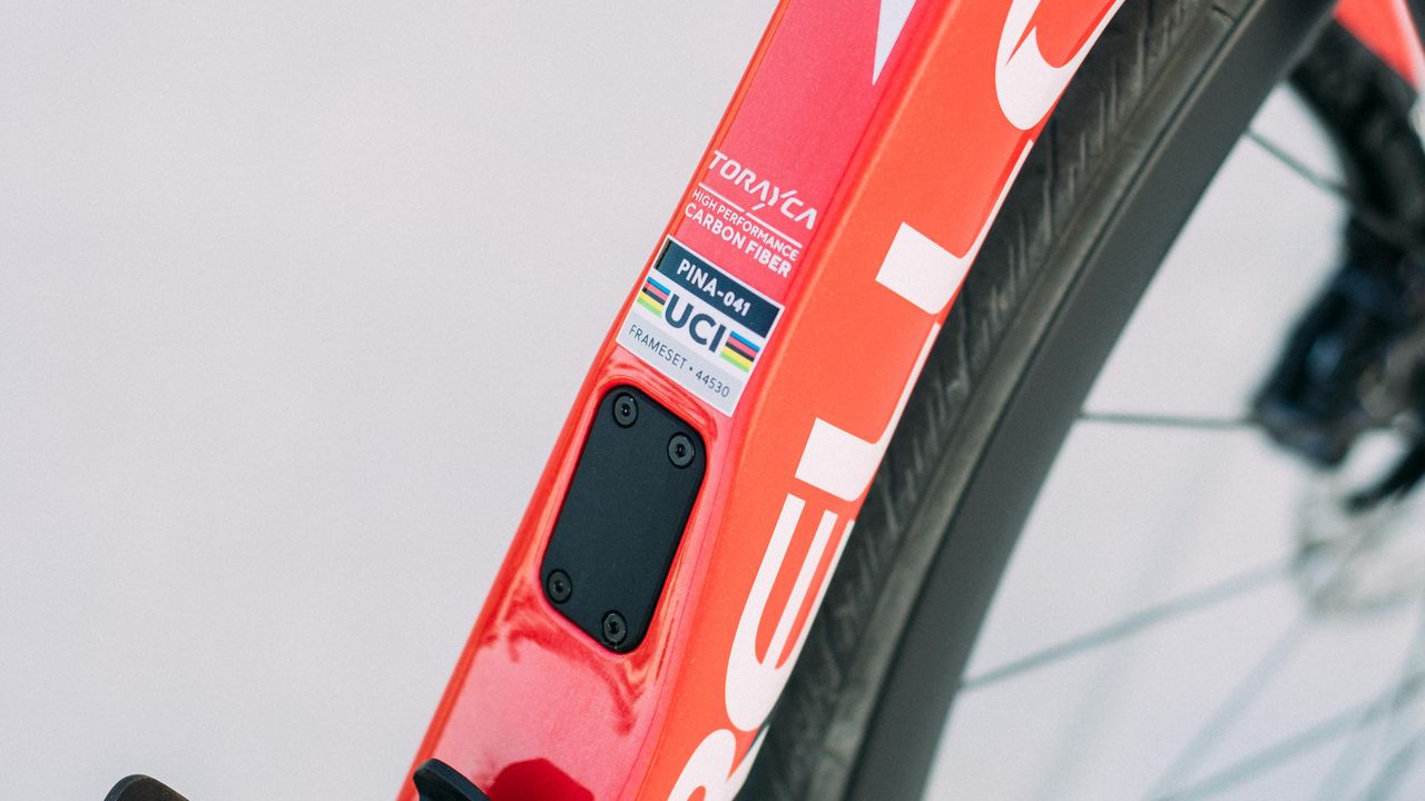 A red and black pinarello F road bike