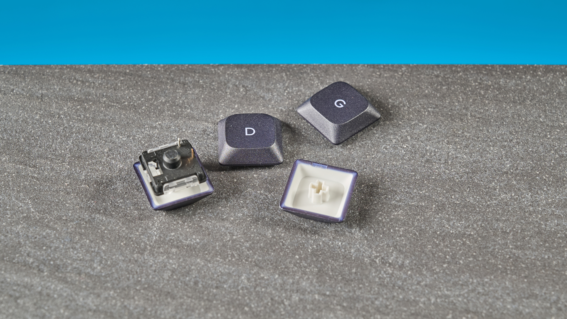 A black IQUNIX MQ80 mechanical keyboard