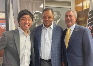 Soo Kim, Standard General Managing Partner and CEO, Rev. Jesse Jackson of Rainbow PUSH Coalition, and Kevin Adell, CEO of The Word Network