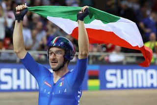 Italy's Elia Viviani celebrates winning the Mens Elimination finals during the UCI Track Cycling World Championships at the Velodrome of SaintQuentinenYvelines southwest of Paris on October 16 2022 Photo by Thomas SAMSON AFP Photo by THOMAS SAMSONAFP via Getty Images