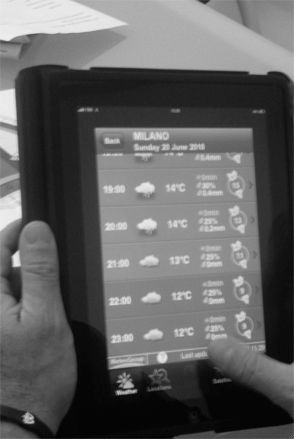 Checking the weather forecast on a tablet
