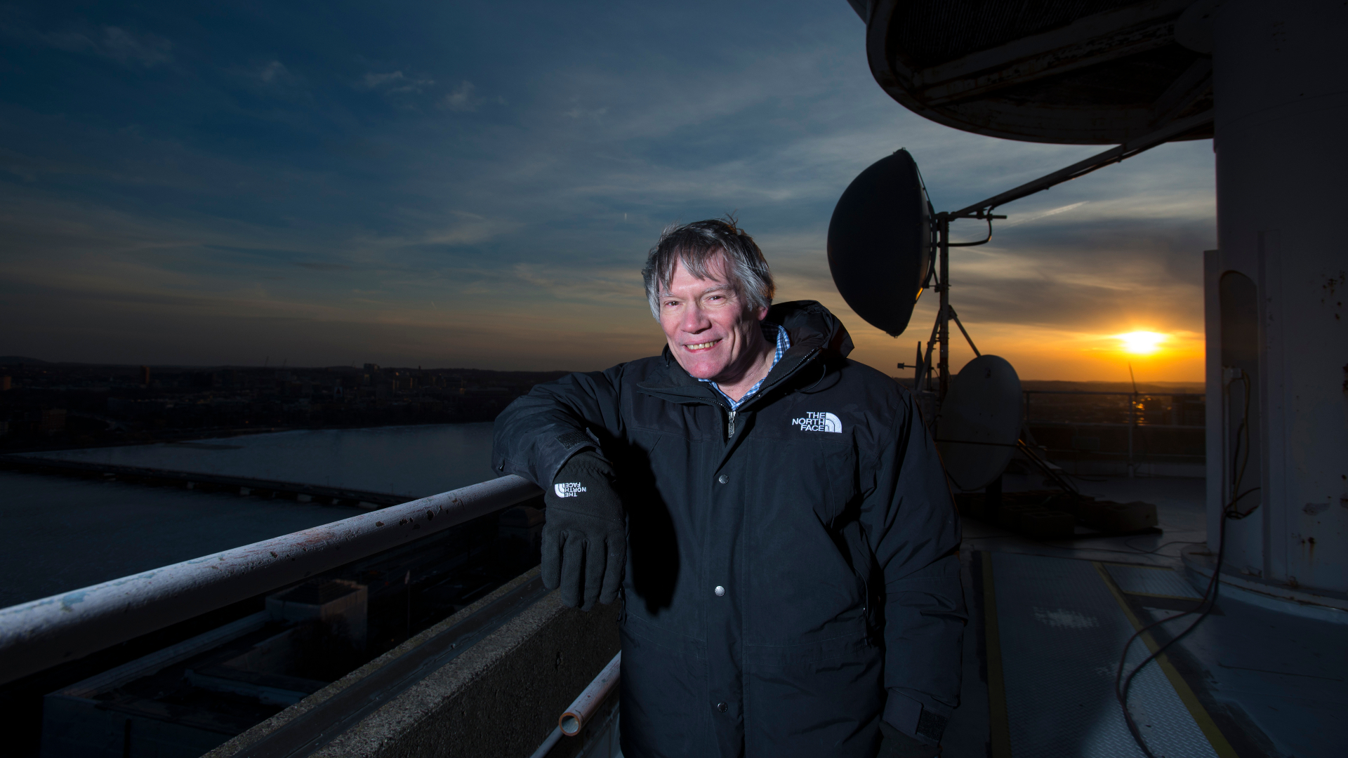 Professor Alan Guth, PhD of the MIT Physics Department with a radio telescope on the roof at MIT on March 14, 2014. Professor Guth was one of the physicists to hypothesize the theory of "Inflation" explaining how the universe was formed after the Big Bang.
