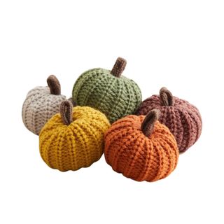 A set of colorful mini knitted pumpkins