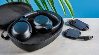 the JBL Tour One M2 headphones with black cups and a black exterior with bluetooth and 2.5mm jack connections