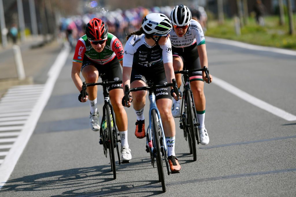 DE PANNE BELGIUM MARCH 24 LR Alice Sharpe of Ireland and Team Ibct Gaia Masetti of Italy and Team Nxtg By Experza and Kirstie Van Haaften of Netherlands and Team Parkhotel Valkenburg compete in the breakaway during the 5th Exterioo Womens Classic BruggeDe Panne 2022 a 1628km one day race from Brugge to De Panne Exteriooclassic UCIWWT on March 24 2022 in De Panne Belgium Photo by Luc ClaessenGetty Images