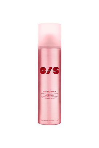 A shiny pink bottle of One/Size On 'Til Dawn Finishing Spray against a white background.