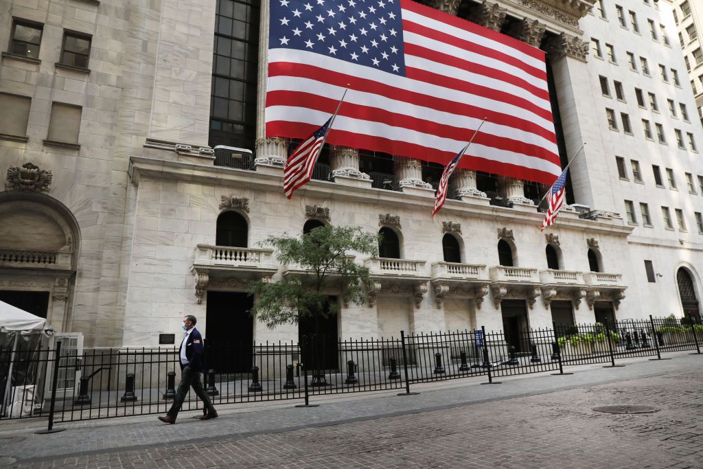 A person walks in front of the New York Stock Exchange (NYSE) in lower Manhattan on September 21, 2020 in New York City.