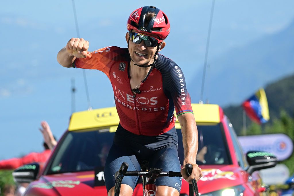 INEOS - Grenadiers' Polish rider Michal Kwiatkowski cycles to the finish line to win the 13th stage of the 110th edition of the Tour de France cycling race, 138 km between Chatillon-sur-Chalaronne in central-eastern France and Grand Colombier, in the Jura mountains in Eastern France, on July 14, 2023. (Photo by Marco BERTORELLO / AFP)