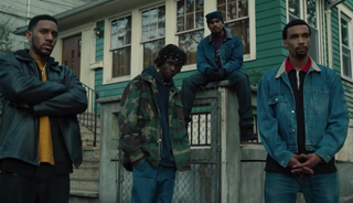 Wu-Tang clan members outside of a house