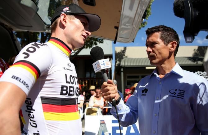 Andr&eacute; Greipel is interviewed by former sprint rival Robbie McEwan in 2014