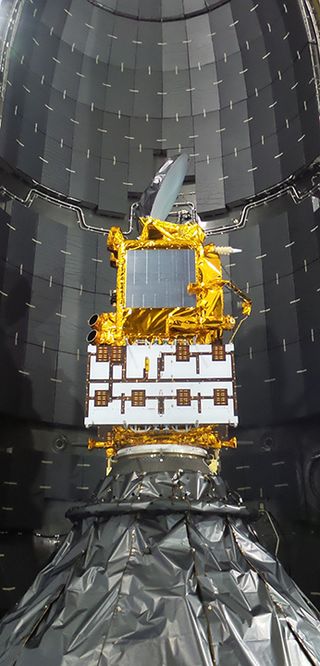 In the SpaceX Payload Processing Facility at Vandenberg Air Force Base in California, scientists and engineers are completing encapsulation of the Jason-3 satellite in its payload fairing ahead of its Jan. 17, 2016 launch.