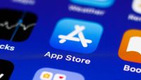 A blue iPhone App Store icon on a blue background