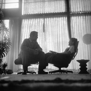 Charles and Ray Eames in their living room