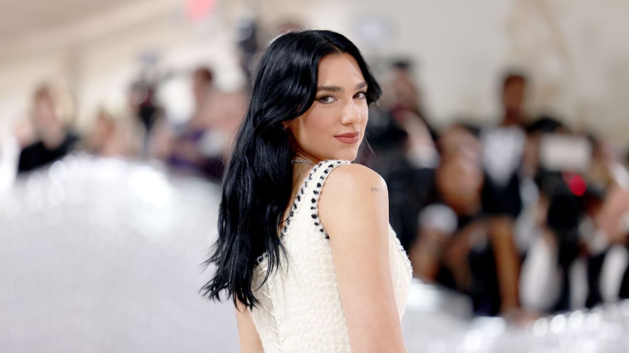 Dua Lipa in a white dress at the MET Gala