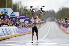 Mathieu van der poel with his bike in the air
