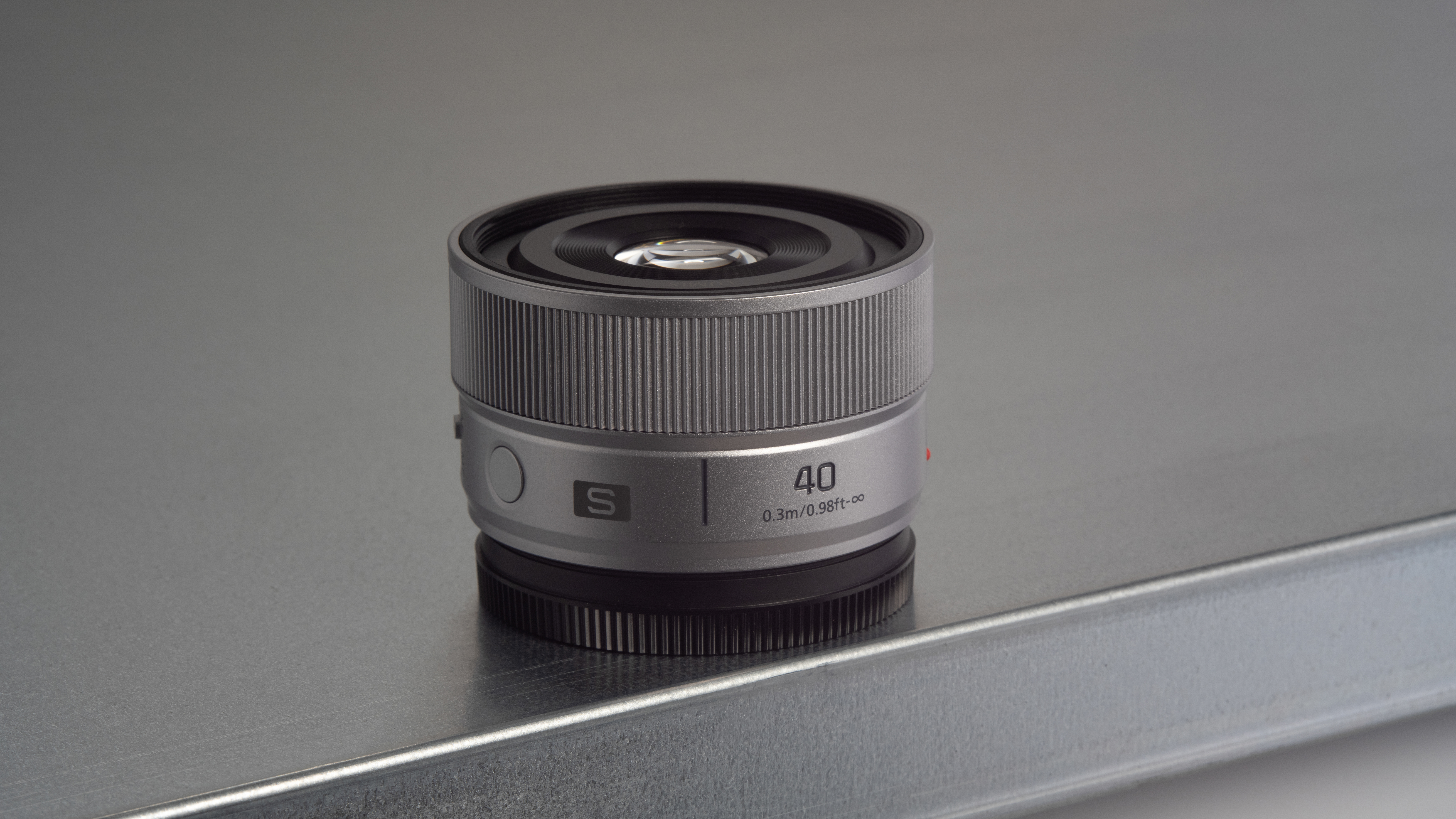 The Panasonic Lumix S 40mm f/2 lens on a table