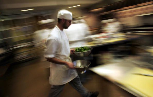 A chef inside a kitchen.