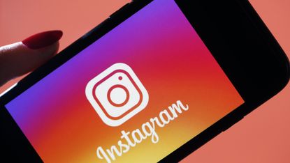In this photo illustration, the social media application logo, Instagram is displayed on the screen of an iPhone on March 15, 2019
