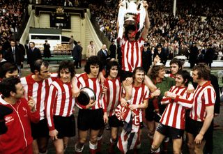 Sunderland’s captain Bobby Kerr is held aloft by team-mates Billy Hughes and Jim Montgomery after the FA Cup Final victory