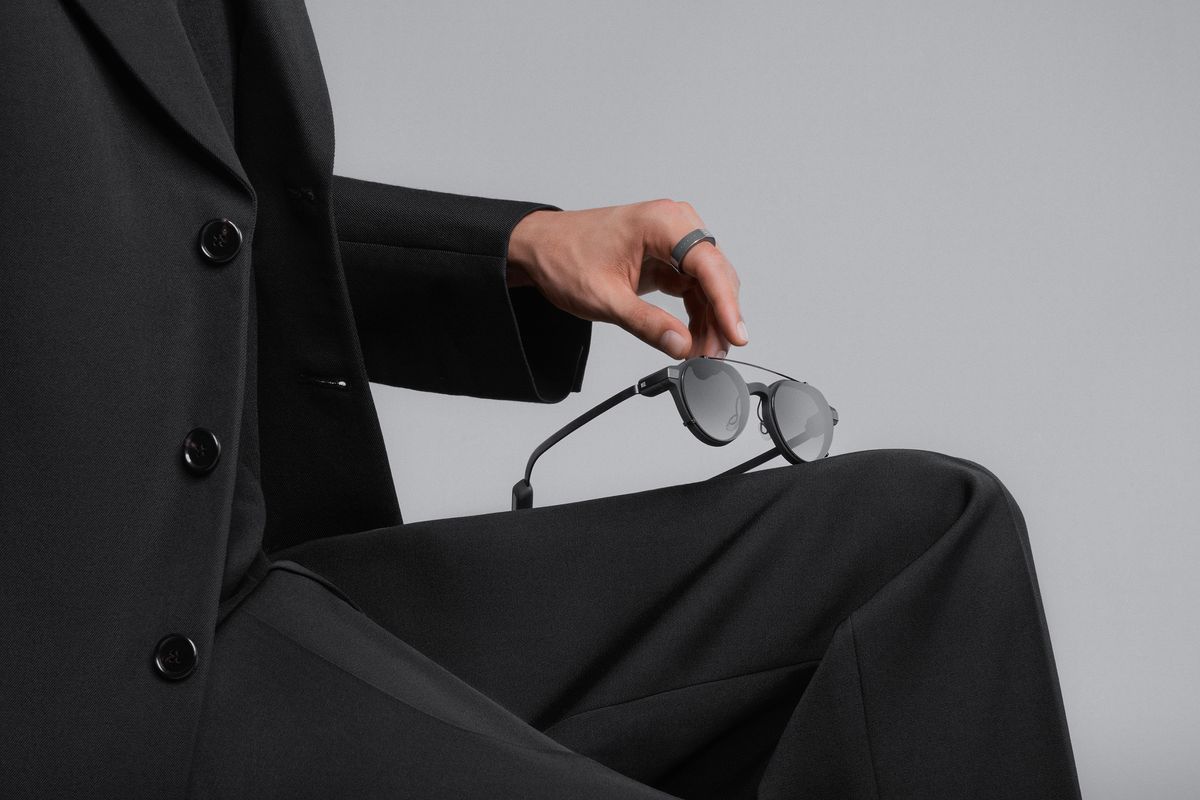 Even G2 smart glasses and R1 ring on a lap