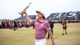 Cameron Smith of Australia celebrates with The Claret Jug in celebration of victory on the eighteenth green during Day Four of The 150th Open at St Andrews Old Course